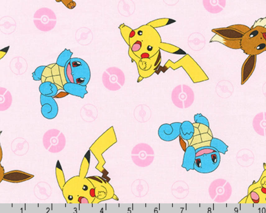Pokemon - Character Toss Pink from Robert Kaufman Fabric